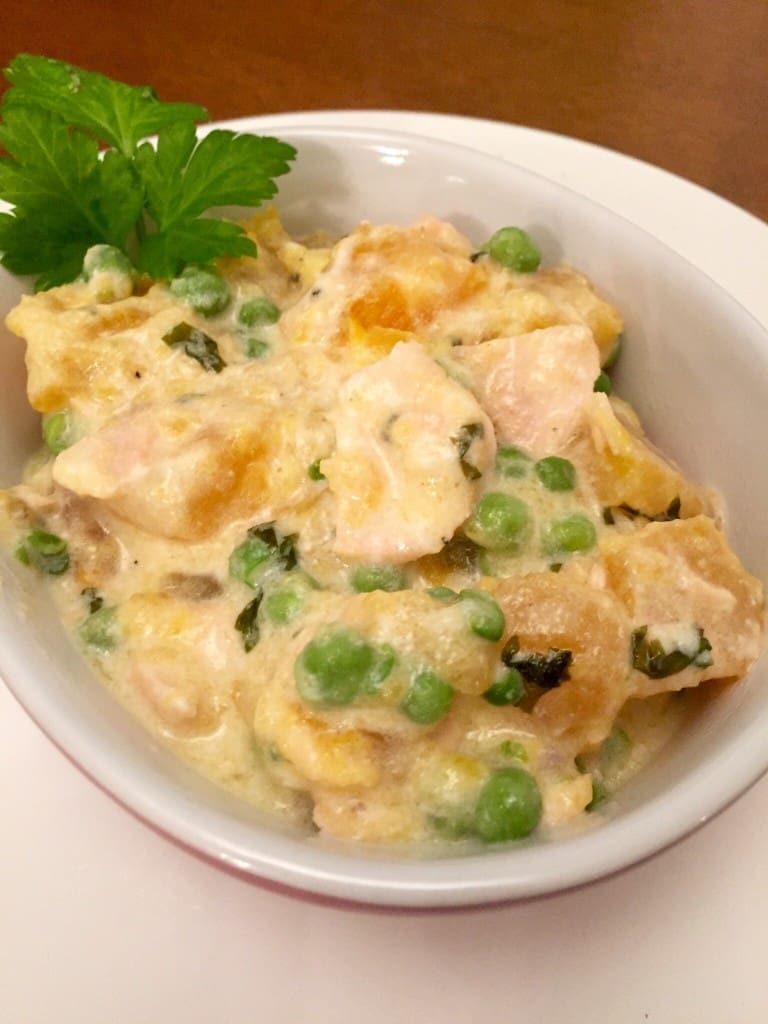 Creamy sweet potato with salmon and petit pois