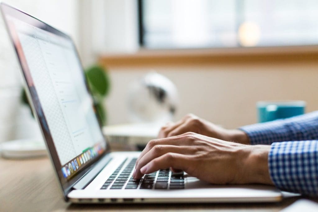 typing laptop computer: create beautiful content